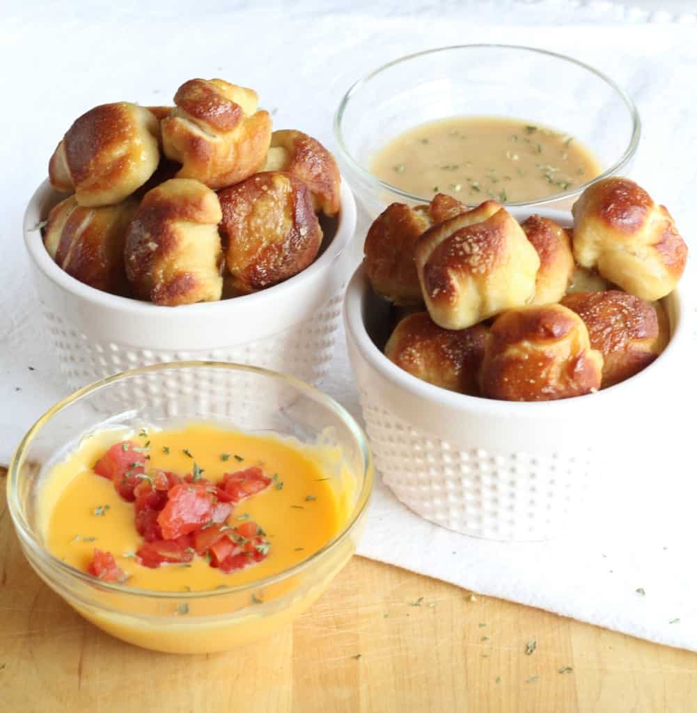 pretzel bites served with dipping sauces