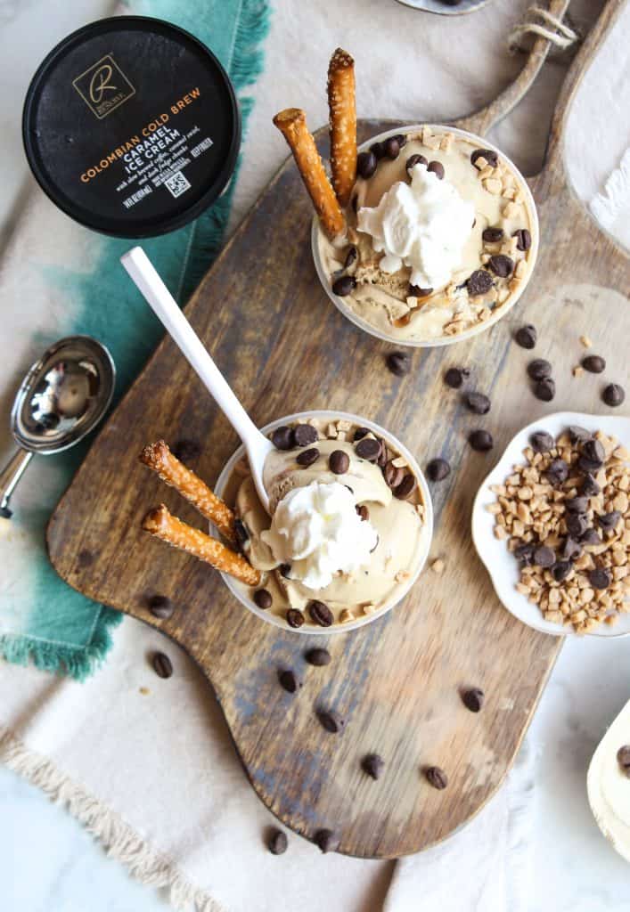 pints of Cold Brew Coffee Caramel Ice Cream Sundaes with toppings