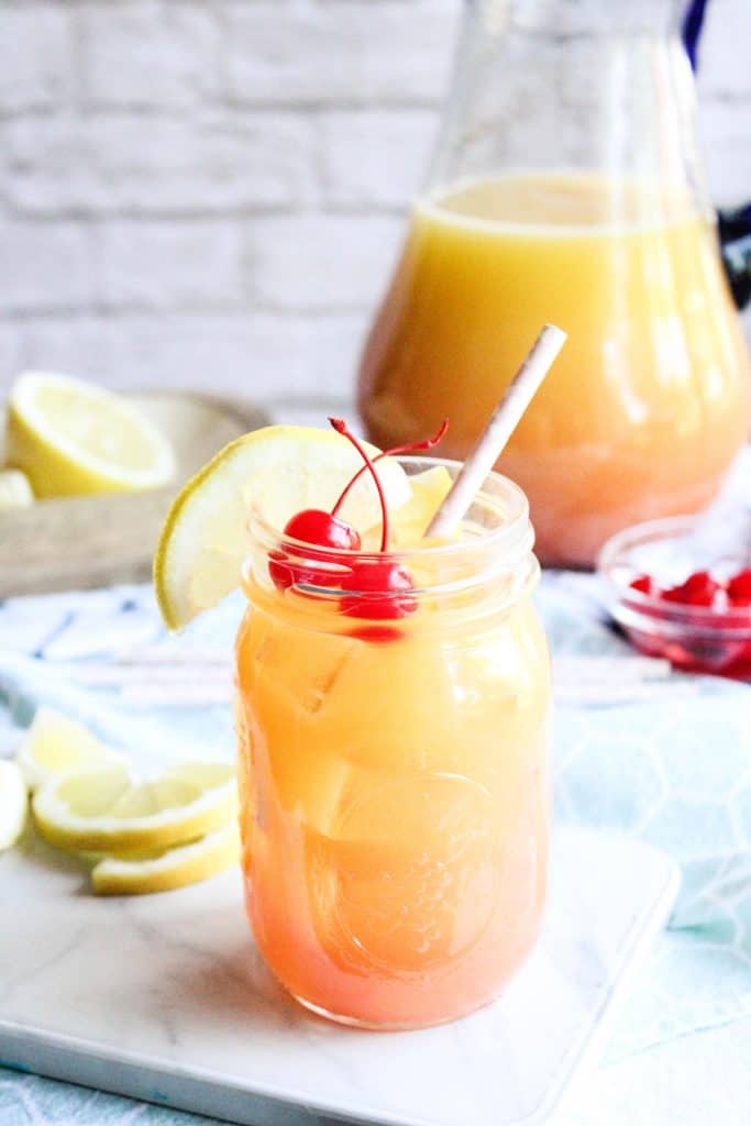 Easy 3-Ingredient Orangeade Drink with cherries