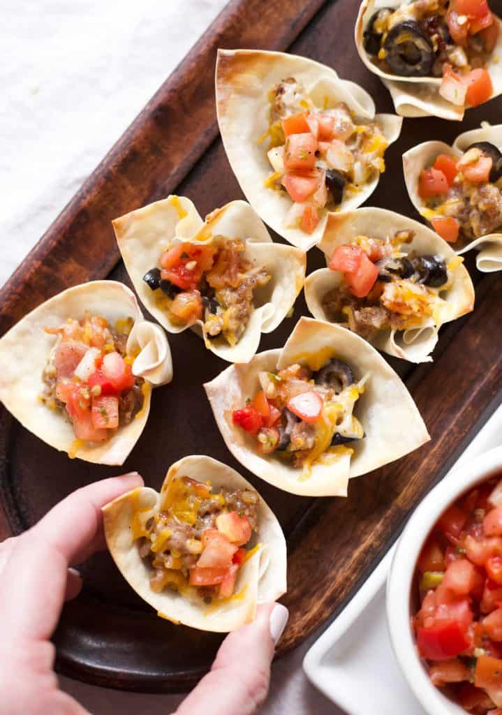 sausage wonton cups on a tray