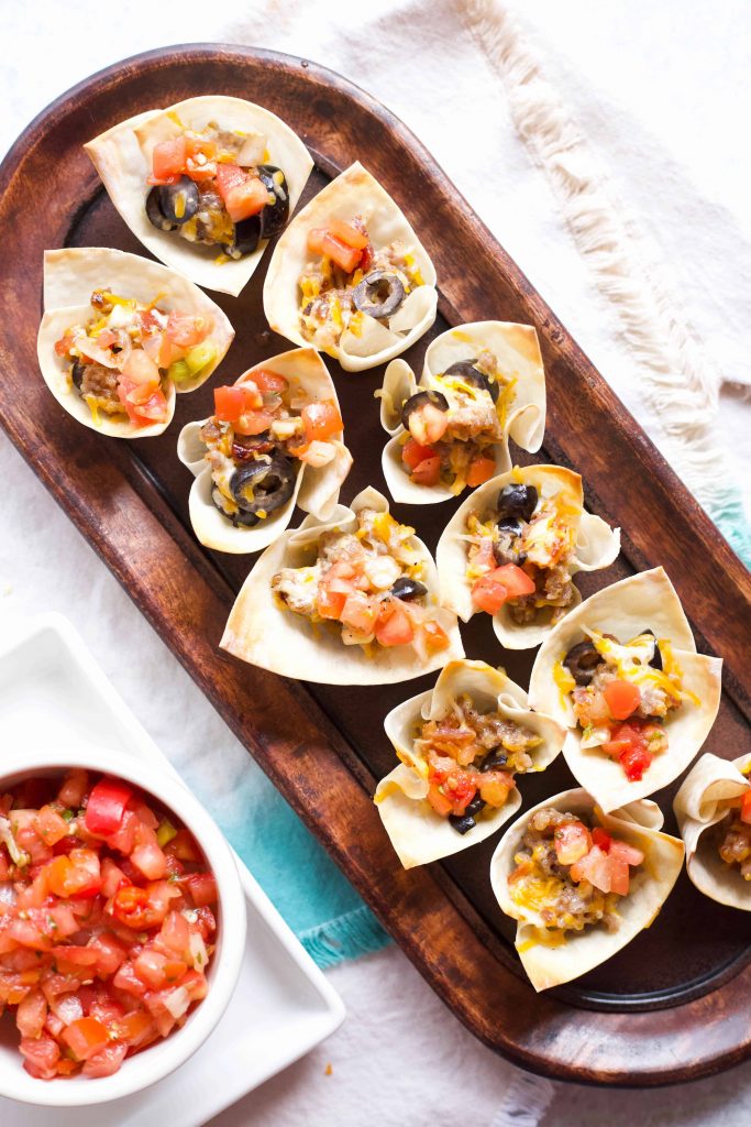 sausage wonton cups on a tray