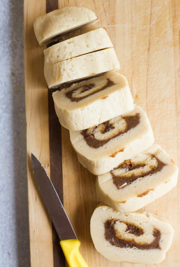 cutting cinnamon rolls