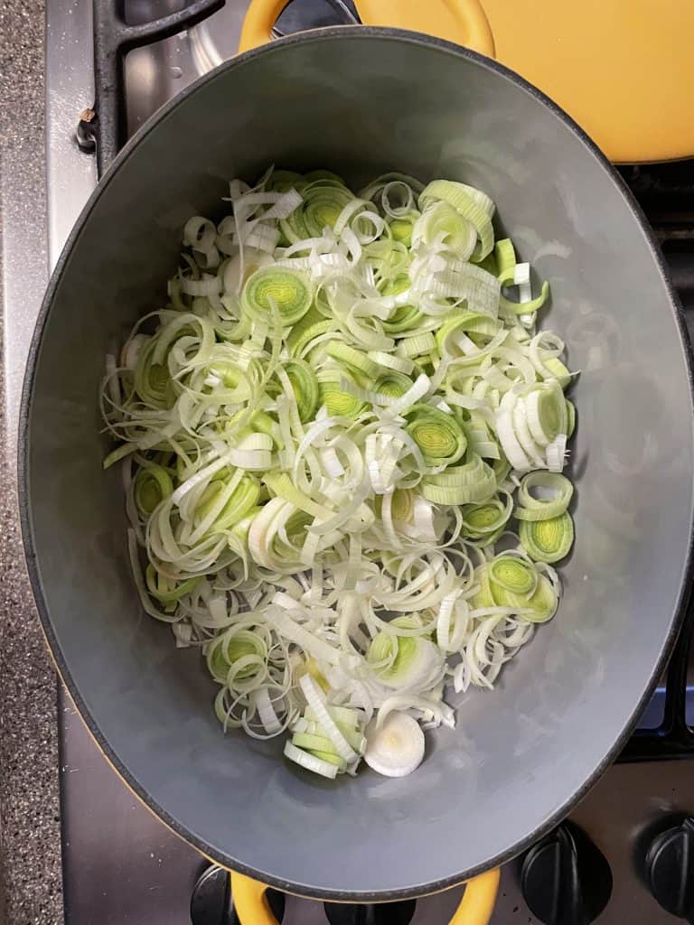 leeks and celery cooking in a pot
