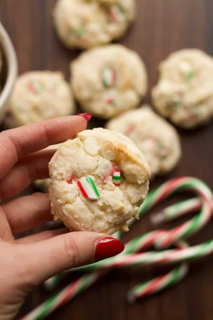 Handing holding a Cake Mix Peppermint Cookie.