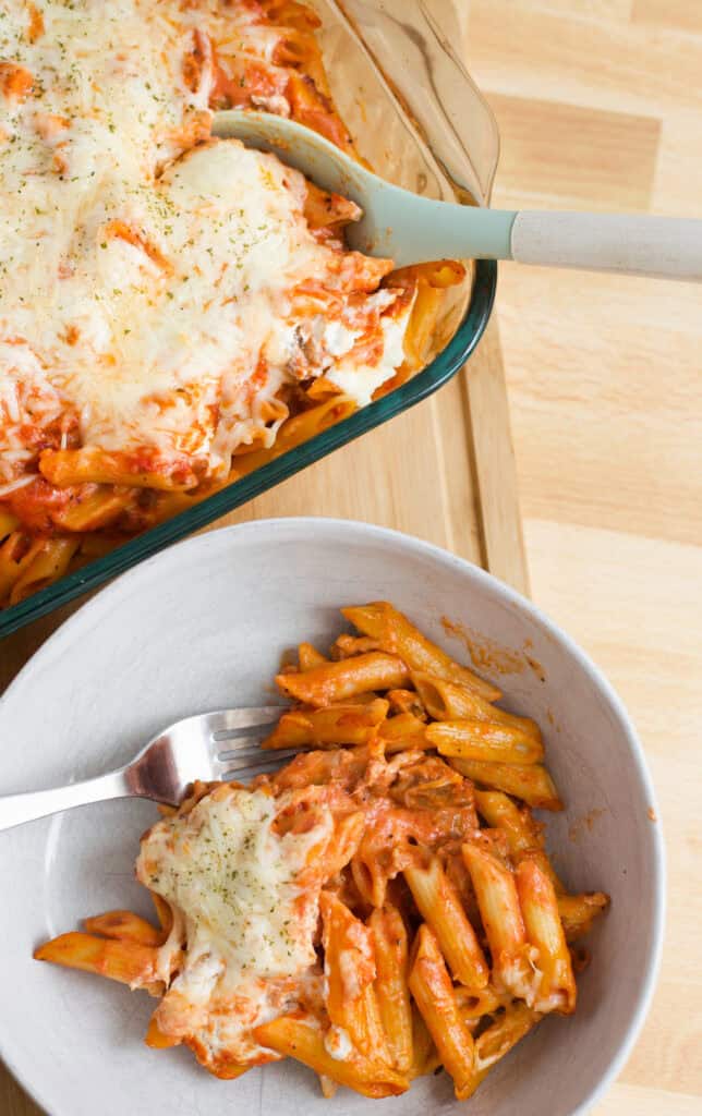 Serving dish with portion of Baked Penne with Vodka Sauce.